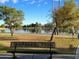 Picturesque view of Chaparral Park lake with lush greenery and scenic walking paths at 6713 N 80Th Pl, Scottsdale, AZ 85250