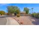 Attractive home with mature trees and a well-maintained, low-water, rock-scape yard at 6713 N 80Th Pl, Scottsdale, AZ 85250