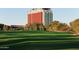 Expansive golf course view with lush green fairways and luxury resort in the background at 6713 N 80Th Pl, Scottsdale, AZ 85250
