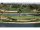 Picturesque golf course with scenic views of water hazards and lush landscaping at 6713 N 80Th Pl, Scottsdale, AZ 85250