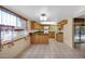 Bright eat-in kitchen with oak cabinets, tile floors and lots of natural light at 6713 N 80Th Pl, Scottsdale, AZ 85250