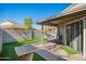 Outdoor patio with a well-maintained lawn and patio furniture at 7018 S 41St Pl, Phoenix, AZ 85042