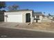 Attractive single-story home featuring a 2-car garage and a cozy entry courtyard at 7018 S 41St Pl, Phoenix, AZ 85042