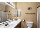 Bathroom featuring tile floors, single vanity with mirror, and shower at 7232 E Nance St, Mesa, AZ 85207