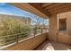 Private balcony with views of lush greenery, perfect for relaxing and enjoying the outdoors at 7777 E Main St # 258, Scottsdale, AZ 85251
