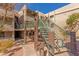 Exterior view of the building with stairs and well-maintained landscaping around the property at 7777 E Main St # 258, Scottsdale, AZ 85251