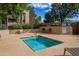 Relax in the community hot tub area, featuring lounge chairs and well-maintained pool rules at 7777 E Main St # 258, Scottsdale, AZ 85251