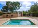 Community hot tub area with lounge chairs, shade trees, and a relaxing atmosphere at 7777 E Main St # 258, Scottsdale, AZ 85251