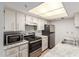 The well-equipped kitchen features stainless steel appliances and sleek cabinetry at 7777 E Main St # 258, Scottsdale, AZ 85251