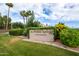 Welcoming entrance to Scottsdale Springs Condominiums, a vibrant community with lush greenery and curb appeal at 7777 E Main St # 258, Scottsdale, AZ 85251
