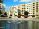 Serene pond with a fountain and lush landscaping, offering a peaceful outdoor setting at 7940 E Camelback Rd # 403, Scottsdale, AZ 85251