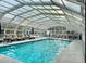 Enjoy year-round swimming in this bright indoor pool with lounge chairs and tables at 7940 E Camelback Rd # 403, Scottsdale, AZ 85251
