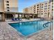 Resort-style pool with lounge chairs and shaded areas, perfect for relaxation and outdoor enjoyment at 7940 E Camelback Rd # 403, Scottsdale, AZ 85251