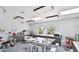 Bright work area with multiple work stations, cabinetry, and natural light from the windows at 7940 E Camelback Rd # 403, Scottsdale, AZ 85251