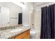 The bathroom features a sink and a combined tub and shower area at 817 S 123Rd Dr, Avondale, AZ 85323
