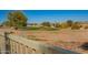Scenic view of the golf course with manicured greens and mature trees, perfect for golfers at 817 S 123Rd Dr, Avondale, AZ 85323