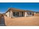 Backyard featuring an outdoor patio and sliding glass doors at 855 W Peralta Pass, Apache Junction, AZ 85120