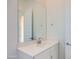 Bathroom featuring a modern vanity with quartz counters, a large mirror, and chrome hardware at 855 W Peralta Pass, Apache Junction, AZ 85120