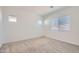 Carpeted bedroom has two windows for natural light at 855 W Peralta Pass, Apache Junction, AZ 85120