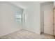 Neutral bedroom with a window for natural light and closet at 855 W Peralta Pass, Apache Junction, AZ 85120