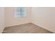Neutral bedroom with a window for natural light and wood-look flooring at 855 W Peralta Pass, Apache Junction, AZ 85120