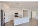 Contemporary kitchen equipped with white cabinets, stainless steel appliances, and a center island at 855 W Peralta Pass, Apache Junction, AZ 85120
