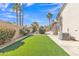 Well-maintained backyard with turf, privacy fence, and desert landscaping at 9167 E Tarantini Ln, Scottsdale, AZ 85260