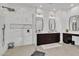 Modern bathroom with dual sinks, a glass-enclosed shower, and stylish finishes at 9167 E Tarantini Ln, Scottsdale, AZ 85260