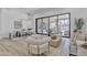 Bright living room with modern decor, large glass doors, and neutral tones at 9167 E Tarantini Ln, Scottsdale, AZ 85260