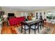 Spacious living room and dining area combination with stylish decor at 9401 W Raintree Dr, Sun City, AZ 85351
