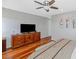 Serene main bedroom features hardwood floors and ample storage at 9401 W Raintree Dr, Sun City, AZ 85351