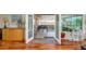 Indoor view to outdoor patio with seating area visible through glass doors at 9401 W Raintree Dr, Sun City, AZ 85351