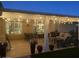 Inviting covered patio with stylish lighting and comfortable seating arrangement at 9401 W Raintree Dr, Sun City, AZ 85351