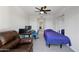 Bedroom with a large workspace and a comfortable reclining chair at 985 N Granite Reef Rd # 127, Scottsdale, AZ 85257