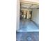 Spacious garage leading into the laundry room with lots of storage space at 985 N Granite Reef Rd # 127, Scottsdale, AZ 85257