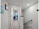 Bright hallway entrance leading into bedroom featuring a ceiling fan at 985 N Granite Reef Rd # 127, Scottsdale, AZ 85257