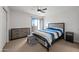 The main bedroom showcases a neutral color palette, a sliding glass door, and modern furnishings at 985 N Granite Reef Rd # 127, Scottsdale, AZ 85257