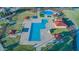 Aerial view of the community pool, splash pad, shaded picnic areas, and landscaping at 10320 E Lupine Ln, Florence, AZ 85132