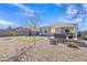 Private backyard with desert landscaping, a covered patio, and a perfect space for outdoor relaxation at 10320 E Lupine Ln, Florence, AZ 85132