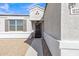 Inviting entryway with a decorative security door, shutters, and desert landscaping for low maintenance at 10320 E Lupine Ln, Florence, AZ 85132