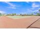 Well-maintained tennis court offers a recreational amenity for residents, and provides exercise at 10320 E Lupine Ln, Florence, AZ 85132