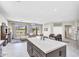 Bright, open-concept living space showcasing the kitchen island, dining area, and inviting sitting area at 108 N Pioneer St, Gilbert, AZ 85233