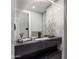 Contemporary bathroom boasts a large vanity, modern mirror and stylish decor at 10800 E Cactus Rd # 38, Scottsdale, AZ 85259