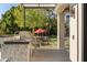 This outdoor kitchen features a built-in grill and ample counter space, perfect for outdoor entertaining at 10800 E Cactus Rd # 38, Scottsdale, AZ 85259