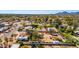 Aerial view of a desert neighborhood with mountain views at 11616 N Miller Rd, Scottsdale, AZ 85260