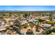 Aerial view of a desert neighborhood with mountain views at 11616 N Miller Rd, Scottsdale, AZ 85260