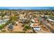 Aerial view of a desert neighborhood with mountain views at 11616 N Miller Rd, Scottsdale, AZ 85260