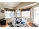 Charming dining room with natural light, stylish decor, and comfortable seating for Gathering meals at 12439 W Monte Vista Rd, Avondale, AZ 85392