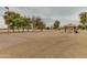 Community park and playground with picnic tables and mature shade trees offers something for everyone at 12439 W Monte Vista Rd, Avondale, AZ 85392