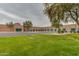 Rancho Santa Fe Elementary School features grassy park and outdoor areas for students at 12439 W Monte Vista Rd, Avondale, AZ 85392